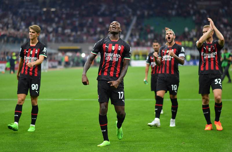 AC Milan's Rafael Leao celebrates with teammates after the match. Reuters