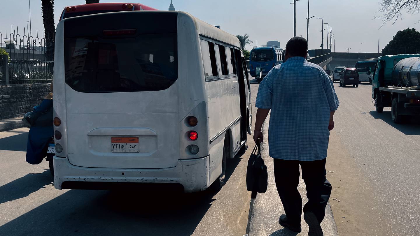 Passengers use familiar hand gestures to inform drivers of their destination, with small circles in the air with the index finger indicate the city’s Circle road. Photo: Mahmoud Nasr / The National