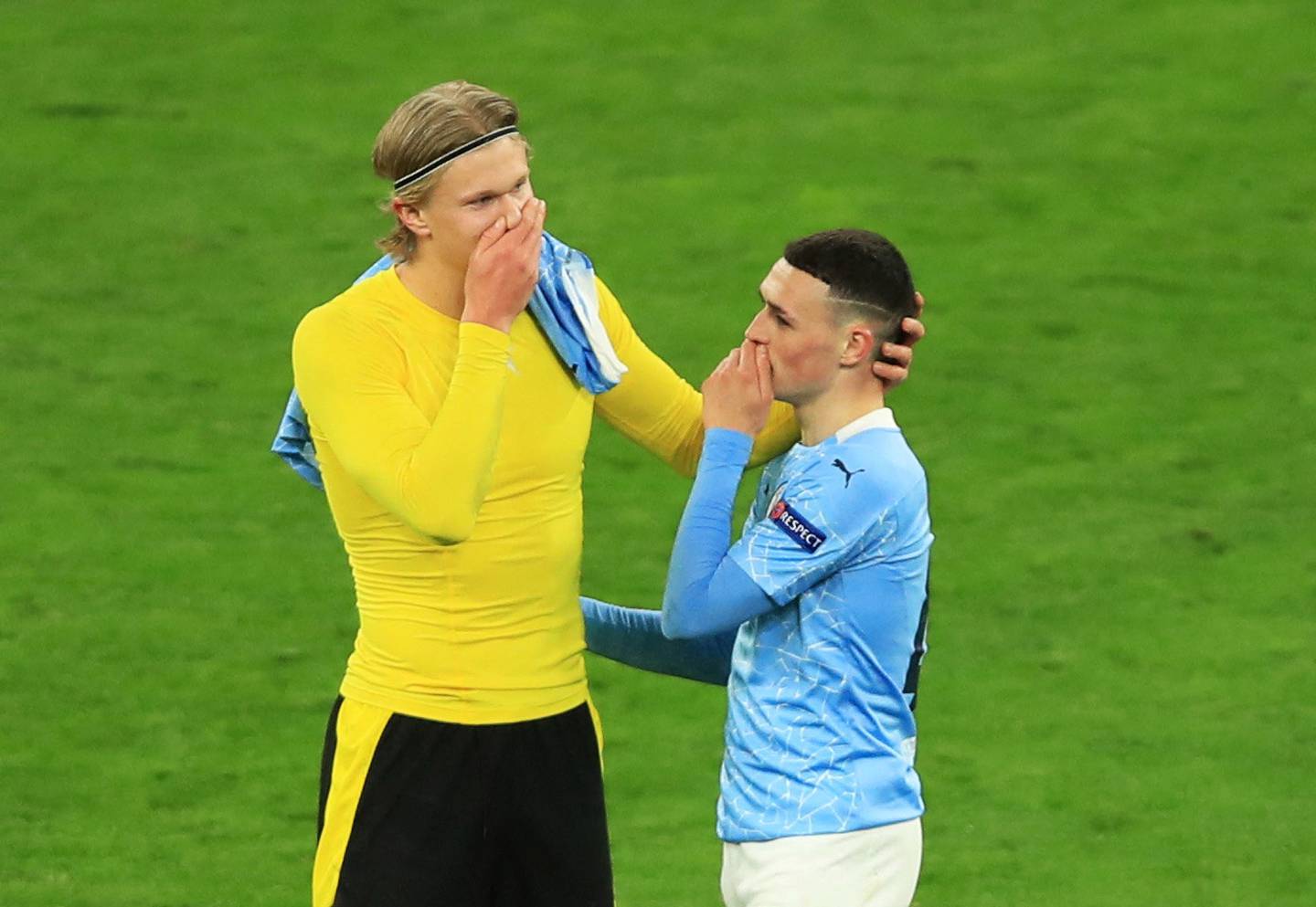 Borussia Dortmund's Erling Haaland and Manchester City's Phil Foden after the teams met in the Champions League in April, 2021. Reuters