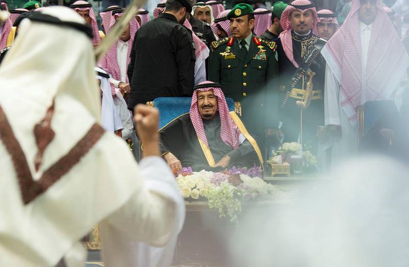 King Salman of Saudi Arabia attends a ceremony of the traditional Ardah dance at the Janadriyah cultural festival in Riyadh. Bandar Algaloud / Courtesy of Saudi Royal Court / Reuters
