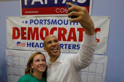 US Senator Cory Booker (D-NJ) takes a selfie after encouraging volunteer campaign canvassers ahead of the midterm elections in Portsmouth, New Hampshire, US. Reuters