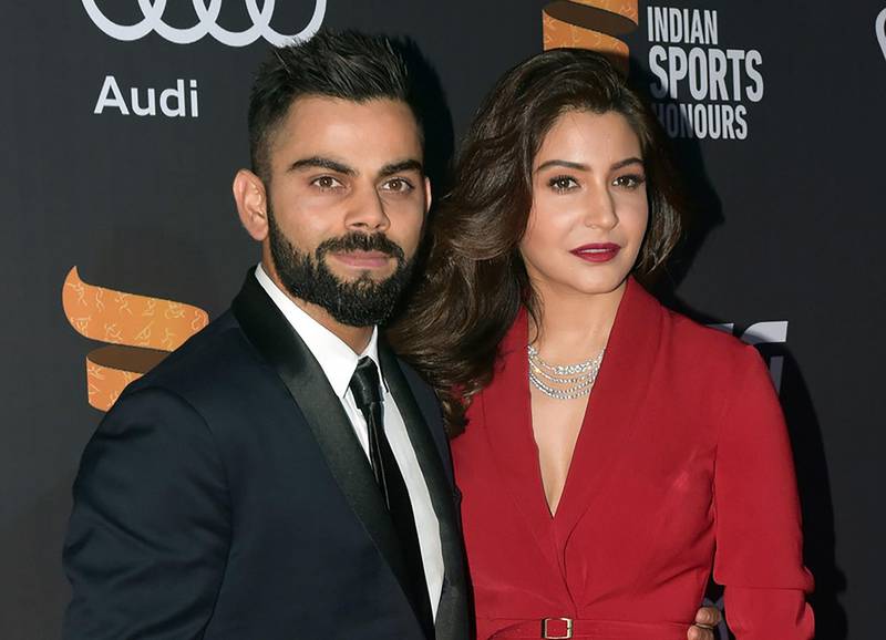 (FILES) This file photo taken on November 11, 2017 shows Indian cricketer Virat Kohli (L) and Bollywood actress Anushka Sharma (R) posing for a picture at the 'Indian Sports Honour Awards 2017' in Mumbai.
India's cricket captain Virat Kohli is set to marry long-time girlfriend and Bollywood actress Anushka Sharma in a much-anticipated wedding in Italy this week, according to December 10 media reports. Rumours were abuzz when Kohli took an unexpected break during the limited-overs leg of the ongoing Sri Lanka series and Sharma also ducked out of her busy acting calender in December.
 / AFP PHOTO / STR
