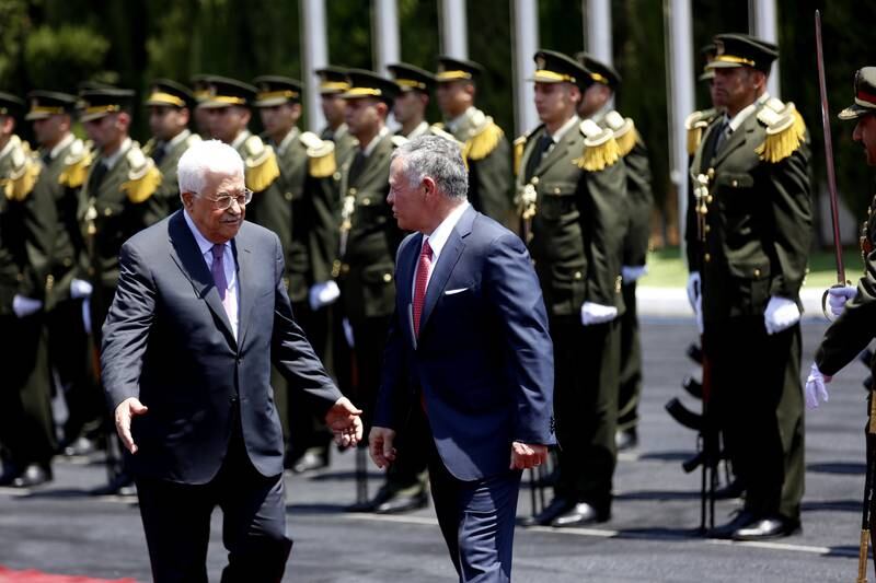 The king's visit was seen by analysts as providing support to Mr Abbas, who has been isolated by Israel over his response to the Al Aqsa row. Alaa Badarneh / EPA