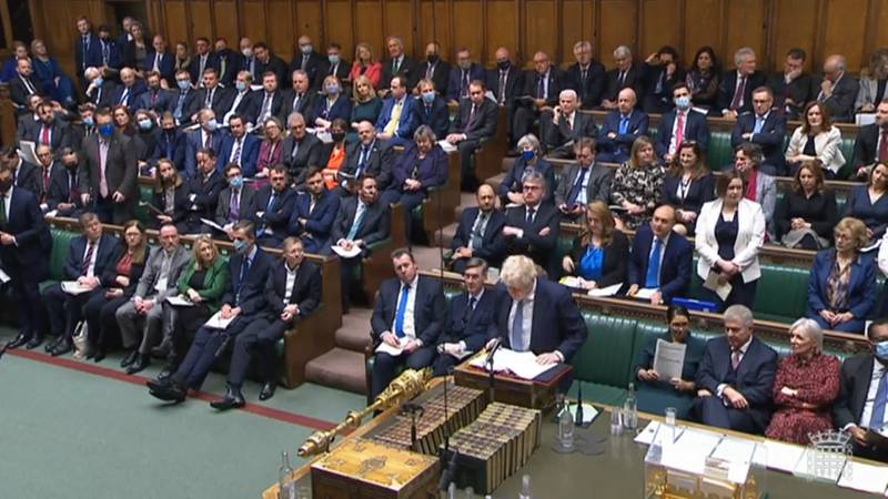Prime Minister Boris Johnson speaks in the House of Commons with Andrew Griffith, Munira Mirza's replacement, seated directly behind him, on Wednesday in London. PA