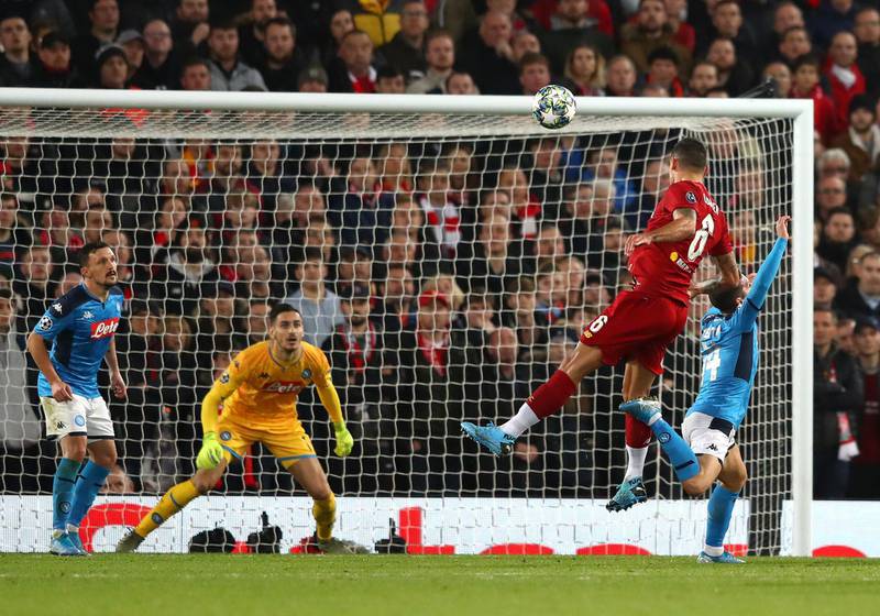 Liverpool's Dejan Lovren of Liverpool scores the equaliser against Napoli at Anfield. Getty