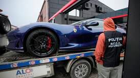 Romanian police seize luxury cars at Andrew Tate's property