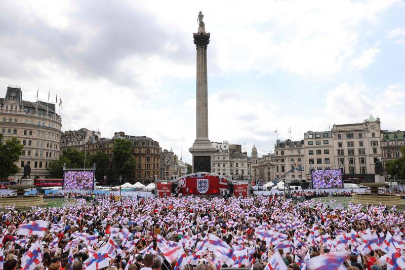 Football fans gather for a victory party in Trafalgar Square in central London after England beat Germany 2-1 to win the Women's Euro 2022 football tournament. AFP
