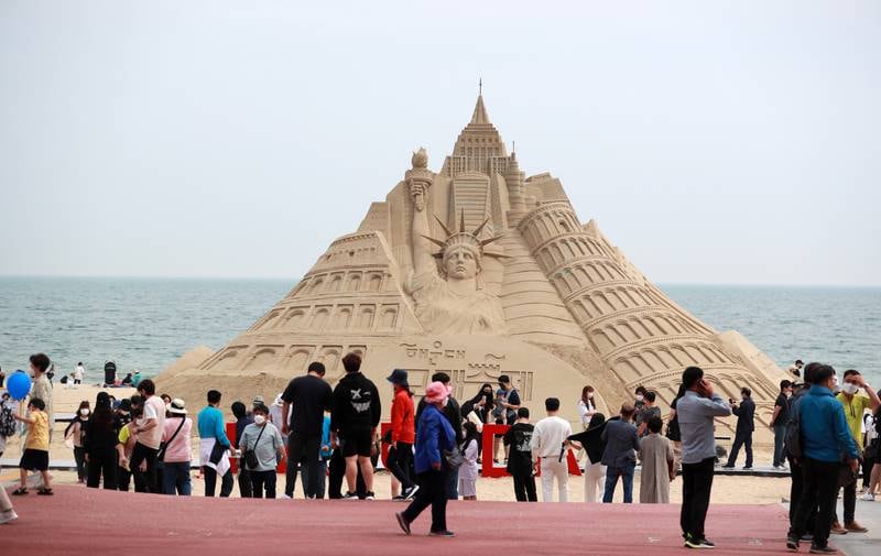 The annual sand festival, featuring sand sculptures, opens at Haeundae Beach in Busan, South Korea. EPA