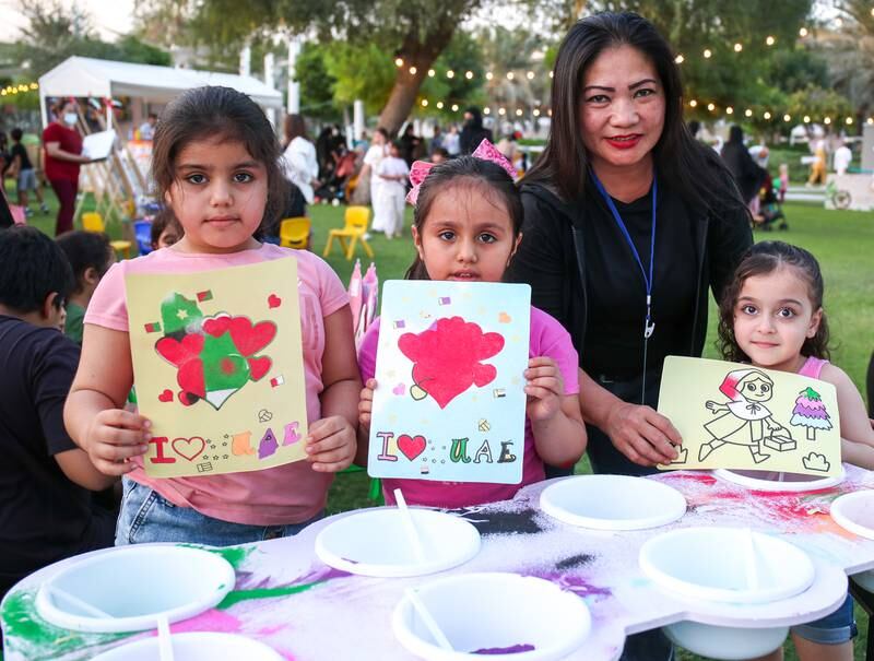The park is a big draw for families. The Al Mansouri family with their sand artwork.