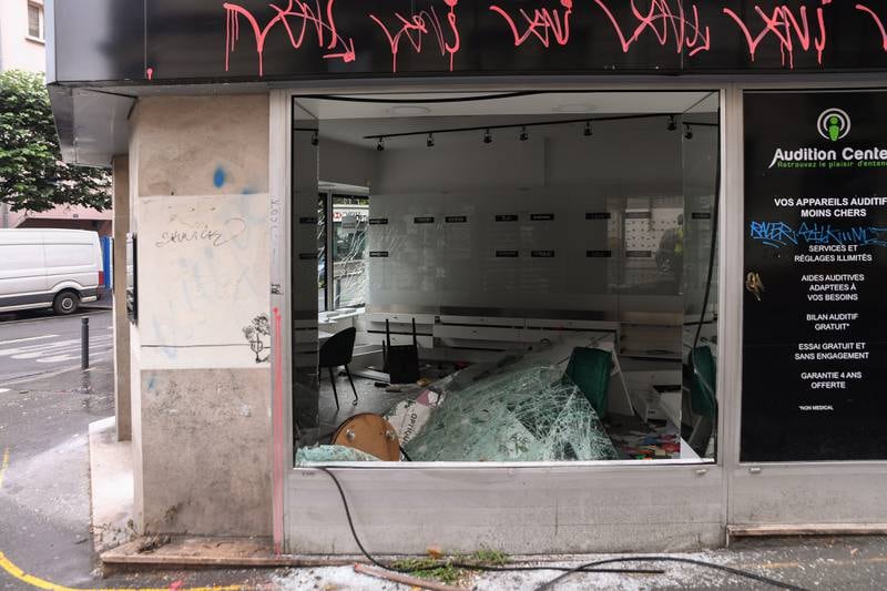 A damaged shop following in Montreuil, near Paris. EPA / Julien Mattia
