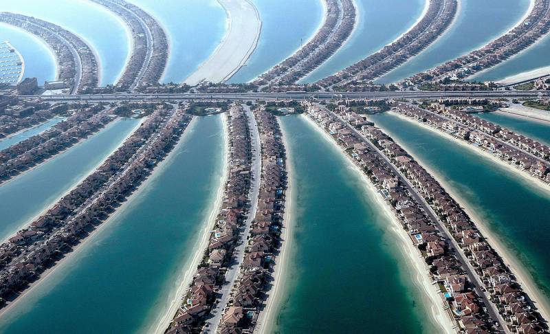 TO GO WITH AFP STORY<br />(FILES) - A picture dated December 17, 2009 shows a partial aerial view of the man-made Palm Jumeirah island built by Nakheel property giant off the coast of the Gulf emirate of Dubai. The Gulf emirate of Dubai, whose biggest state-owned group sparked global fears of a debt default in November when it asked for a six-month debt moratorium, has a history of vast imposing projects. AFP PHOTO/MARWAN NAAMANI *** Local Caption ***  547531-01-08.jpg