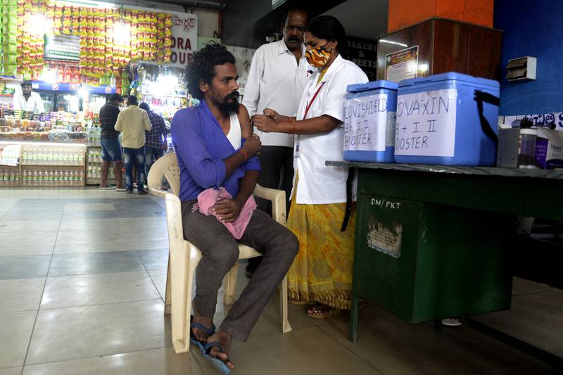 A man receives a Covid-19 vaccine in the Indian city of Hyderabad on Friday, as part of the government's booster campaign. AFP