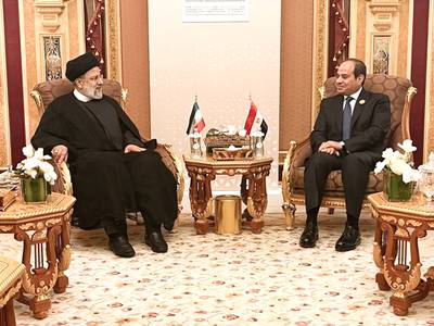 Iran's President Ebrahim Raisi, left, meets Egypt's President Abdel Fattah El Sisi on the sidelines of an emergency Arab-Islamic summit in Riyadh. AFP