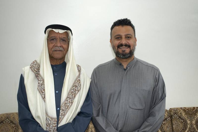 Ghazi Al Mulaifi, right, stands next to one of the original members of the diwaniya. Courtesy Ghazi Al Mulaifi 