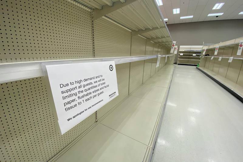 Empty shelving of toilet paper and paper towels is shown at a Target store during the outbreak of the coronavirus disease (COVID-19) in Encinitas, California, U.S., March 29, 2020.      REUTERS/Mike Blake