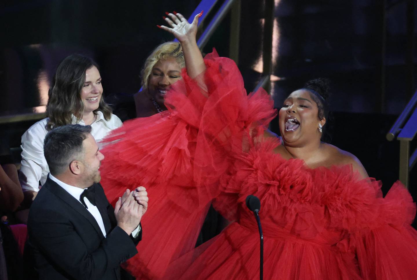 Lizzo wearing a red tulle gown at the 74th Primetime Emmy Awards. Reuters 