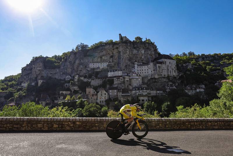 Jonas Vingegaard cycles past the town of Rocamadour during the 20th stage of the Tour de France between Lacapelle-Marival and Rocamadour. AFP