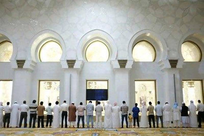 Worshippers at Sheikh Zayed Mosque, Abu Dhabi. Antonie Robertson / The National