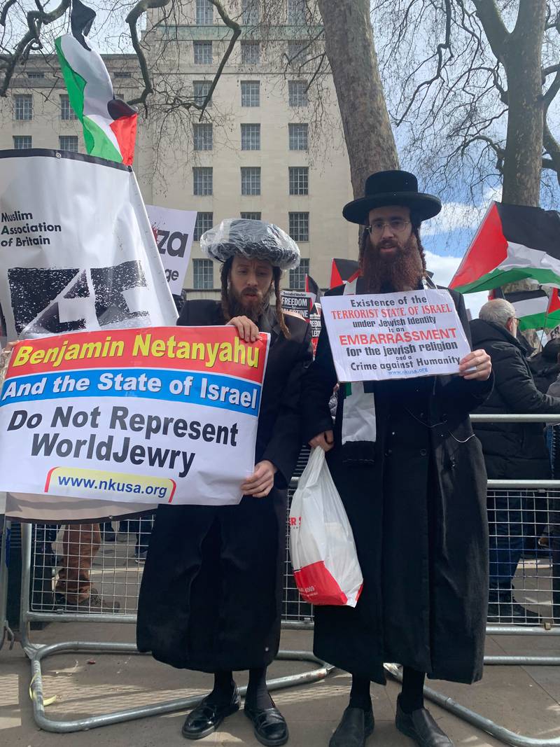 Chaim Blier, right, and a fellow member Neturei Karta, jointed pro-Palestinian protesters in Whitehall. The National