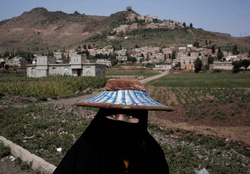 A woman in Ibb, Yemen. Peace is the only road to ending the country’s humanitarian 'catastrophe', Mr Al Qirbi said. AP