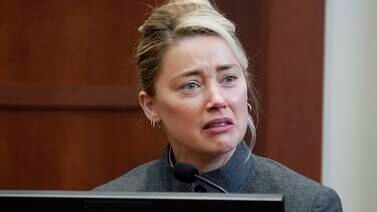 An image that illustrates this article Amber Heard says trial is 'torture' and she wants to 'move on'