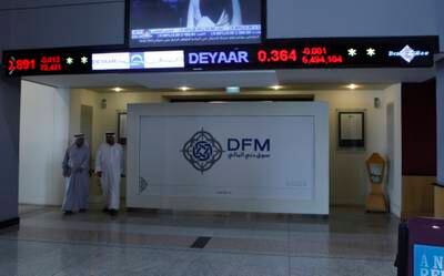 Dubai, United Arab Emirates - August 27, 2012.  Traders at the Dubai Financial Market.  ( Jeffrey E Biteng / The National )