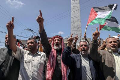 Hamas and Islamic Jihad supporters at a rally on Friday in Khan Yunis. AFP