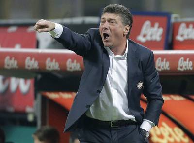 Inter Milan coach Walter Mazzarri gives instructions during his side's Serie A 1-0 win over Sampdoria on Wednesday night. Antonio Calanni / AP / October 29, 2014 