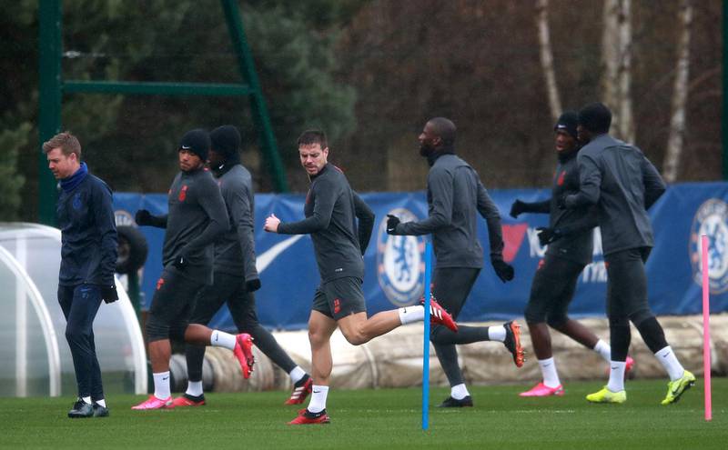 Chelsea's Cesar Azpilicueta (centre) and the rest of the team during a training session at Cobham. PA