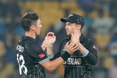 New Zealand's Trent Boult, left, celebrates after dismissing Afghanistan's Ibrahim Zadran. AP 