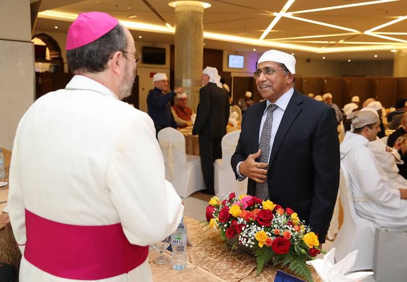 The gathering at Sikh gurdwara - or temple - in Dubai also served as an opportunity to welcome his successor, Bishop Paulo Martinelli, pictured on the left.
