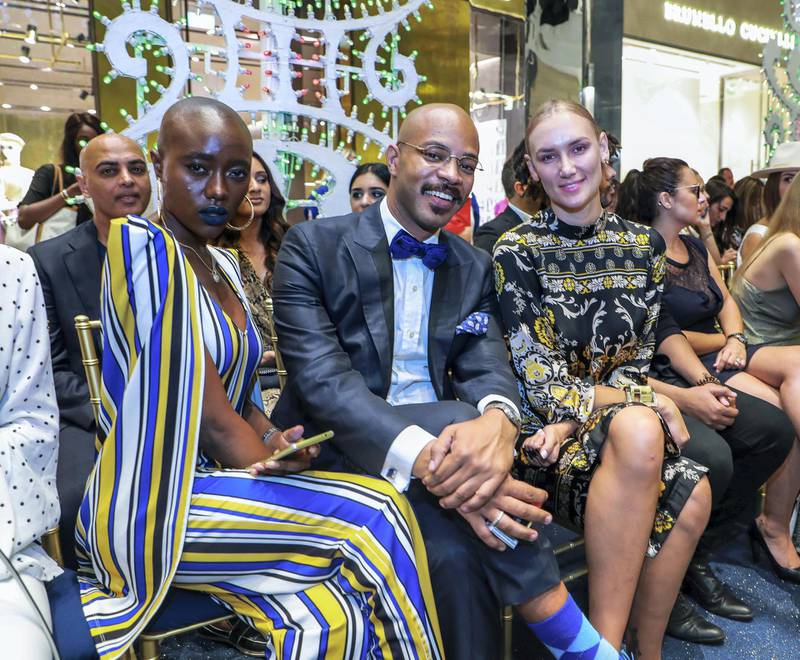 Dubai, U.A.E., October 7,  2018. Dolce & Gabbana Fashion Show, Dubai Mall.-- Winnie Carine, David Charvalho and Mango Dedova.Victor Besa / The NationalSection:  FashionReporter:  Selina Denman