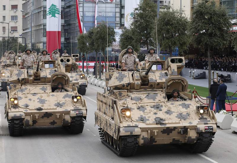 Tanks drive through Beirut.