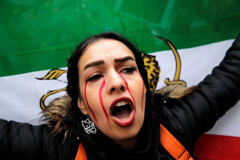 A demonstrator at a protest in support of Iranian women after the death of Mahsa Amini, near the Iranian consulate in Istanbul, Turkey, on November 7.  Reuters
