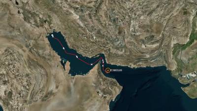 An oil tanker, identified as having been involved in a US-Iran dispute, was boarded by men in military uniforms near Oman. Reuters