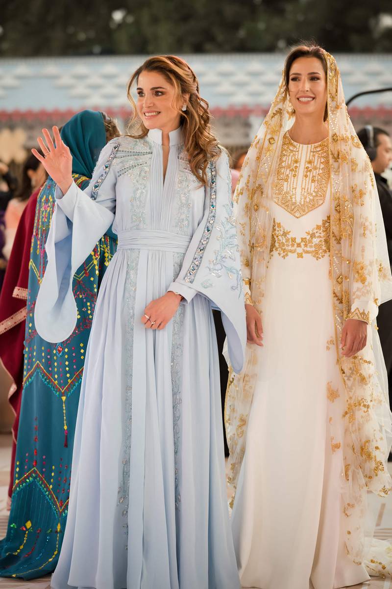 Queen Rania with Rajwa Al Saif at the pre-wedding henna party on May 22. AFP