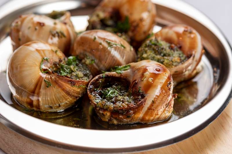 Escargot in butter and parsley sauce. 
