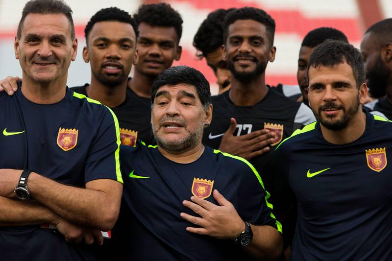 Diego Maradona with his staff and players. Christopher Pike / The National