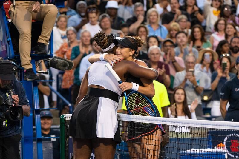 Serena Williams hugs Belinda Bencic after their match. EPA