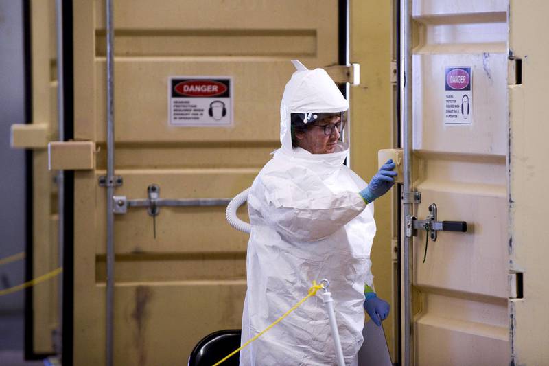 A technician prepares to walk into a decontamination unit in Brighton, Colorado, US. AFP