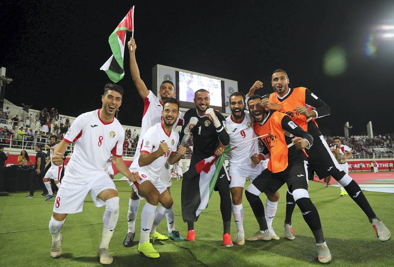 AL AIN , UNITED ARAB EMIRATES , January 10 – 2019 :- Players of Jordan celebrating after won the match against Syria by 2-0 in the AFC Asian Cup UAE 2019 football match between Jordan vs Syria held at Sheikh Khalifa International Stadium in Al Ain. ( Pawan Singh / The National ) For News/Sports/Instagram