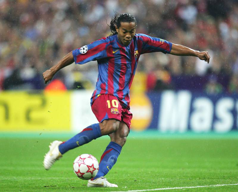 PARIS - MAY 17:  Ronaldinho of Barcelona shoots during the UEFA Champions League Final between Arsenal and Barcelona at the Stade de France on May 17, 2006 in Paris, France.  (Photo by Laurence Grifftihs/Getty Images)