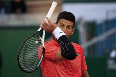 Der Serbe Novak Djokovic reagiert während seines Spiels gegen den Italiener Lorenzo Musetti beim Monte-Carlo ATP Masters Series-Turnier der Runde der 16 Tennisspiele in Monte Carlo am 13. April 2023. (Foto von Valery HACHE / AFP)