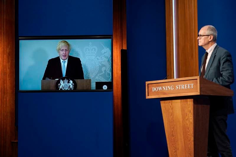 Chief Scientific Advisor Patrick Vallance attends a media briefing on coronavirus at Downing Street with Boris Johnson attending online via a screen from Chequers, the country house of the prime minister, where he was self-isolating on July 19.
