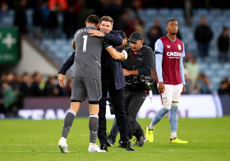 Aston Villa goalkeeper Emiliano Martinez hugs manager Steven Gerrard at the end of the match. PA