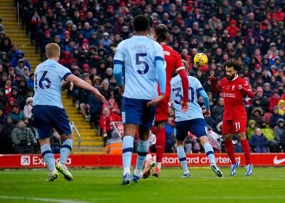 Liverpool's Mohamed Salah heads home his second goal. PA
