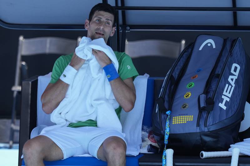 Novak Djokovic takes a break. AP