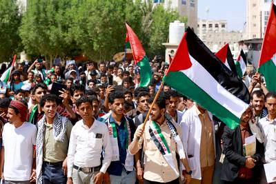 Marchers in Marib, Yemen, wave Palestinian flags to show solidarity with the Palestinians of the West Bank and the Gaza Strip. AFP