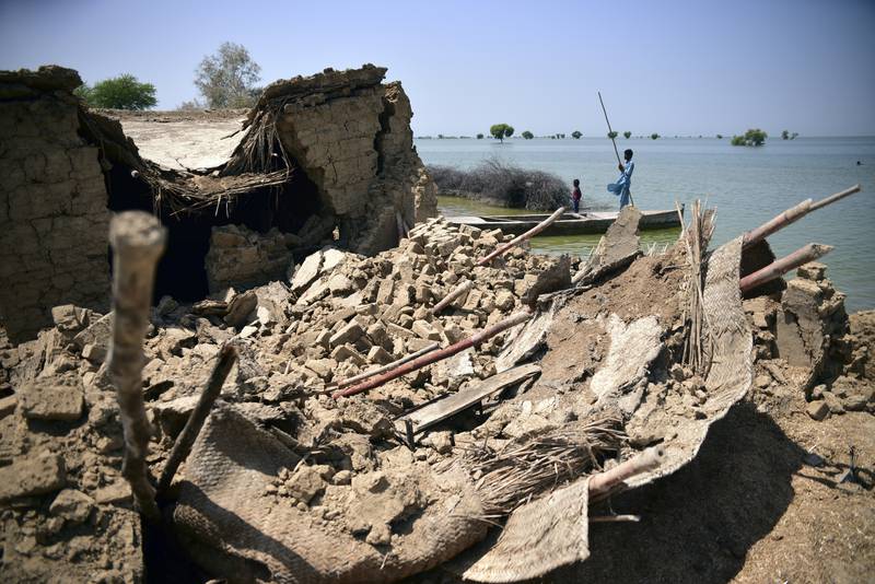 A home damaged by floodwaters in Sehwan, Sindh province. AP