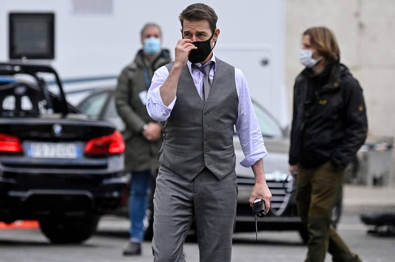 Tom Cruise seen on set wearing a face mask during the shooting of 'Mission: Impossible 7' at Piazza Venezia in Rome, Italy on November 29, 2020. EPA